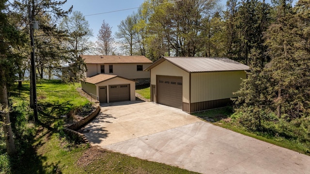 view of front of house featuring an outbuilding and a garage