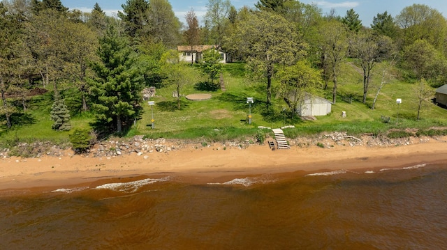 bird's eye view with a beach view and a water view