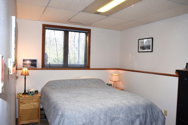 bedroom featuring a paneled ceiling