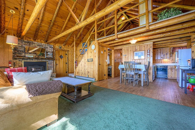22077 Csah 14, Darwin, MN 55324 - living room featuring high vaulted ceiling, a wood ceiling with exposed beams, wooden walls, a brick fireplace, and wood finished floors