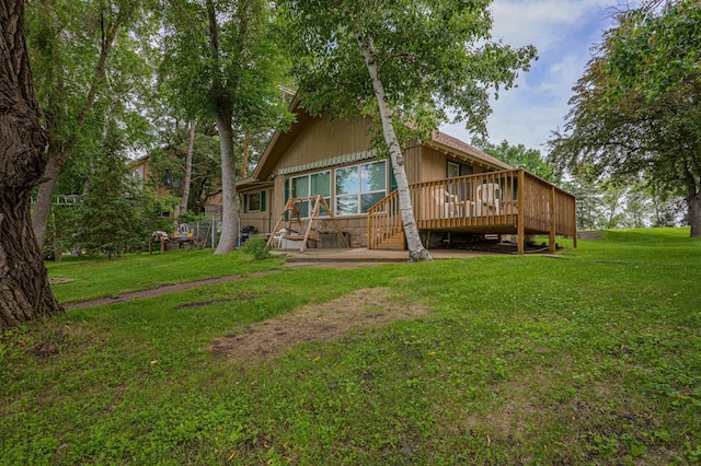 22077 Csah 14, Darwin, MN 55324 - back of property with a wooden deck and a yard