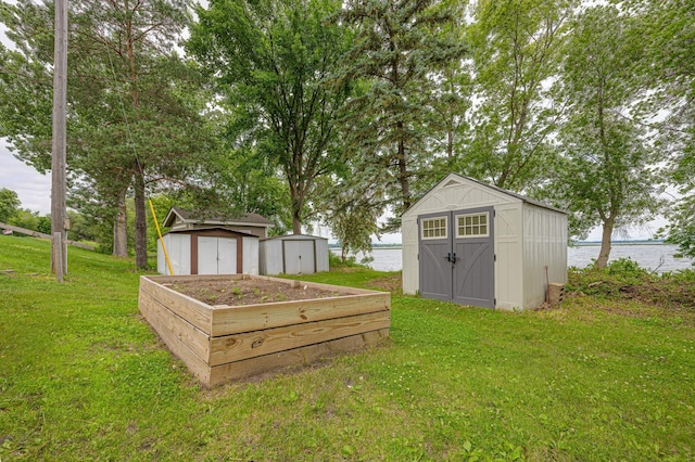 22077 Csah 14, Darwin, MN 55324 - view of grassy yard featuring a shed