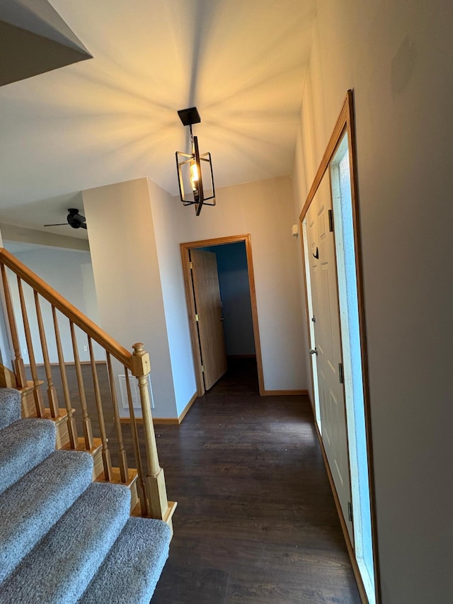 corridor with dark wood-type flooring