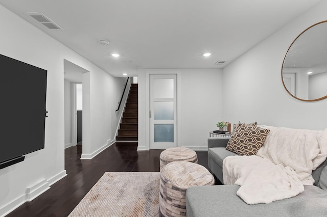 living room featuring dark hardwood / wood-style floors