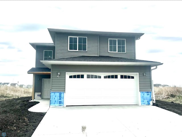 6273 86th Ave S, Horace, ND 58047 - view of front of house with an attached garage and driveway