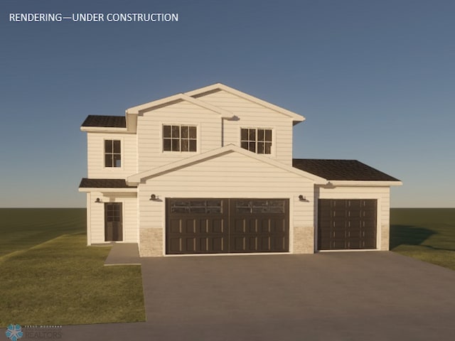 view of front of home with a garage