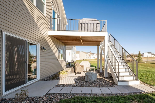 view of patio featuring a balcony