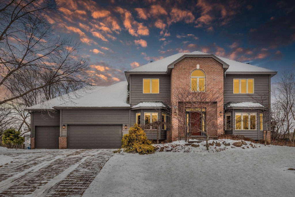 front facade with a garage