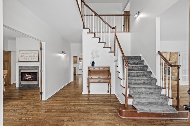 stairs with wood-type flooring