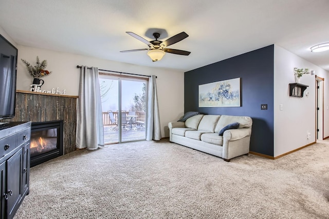 living room with ceiling fan and carpet floors