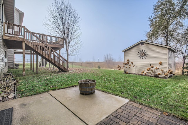 view of yard with a patio area and a deck