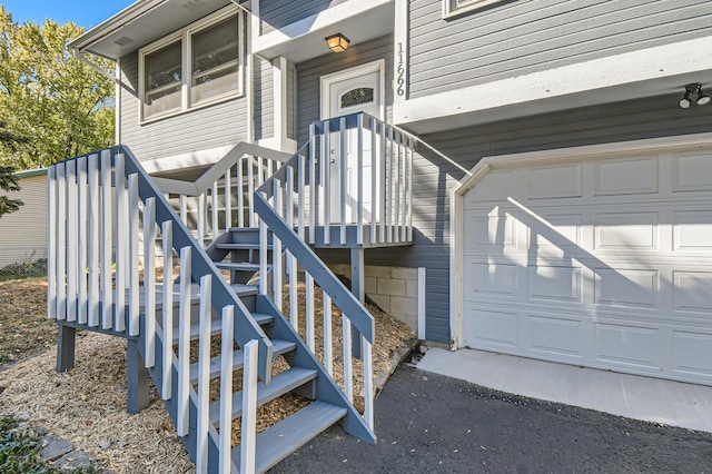 property entrance featuring a garage