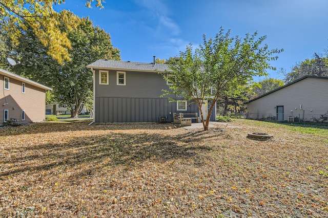 back of property with central AC unit