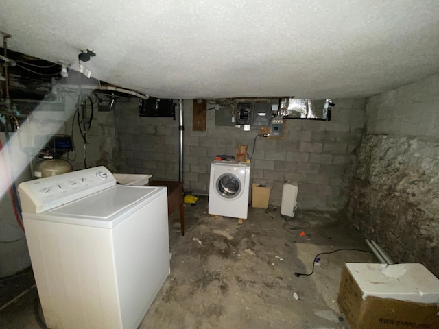 laundry area with separate washer and dryer