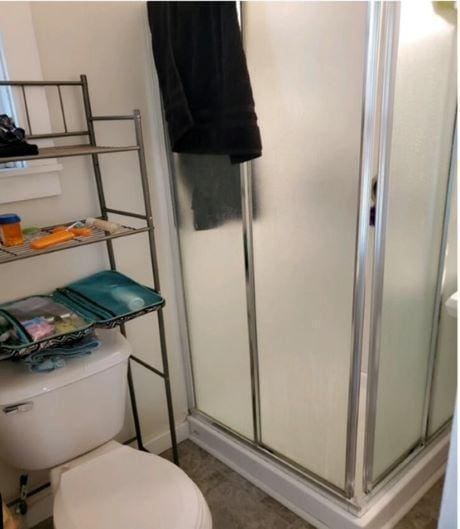 217 Spring St, Mankato, MN 56001 - bathroom featuring a shower stall