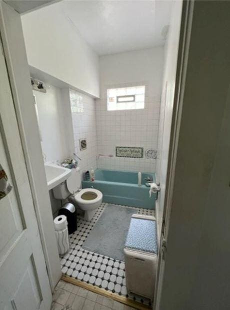 217 Spring St, Mankato, MN 56001 - full bathroom featuring a tub and tile patterned flooring