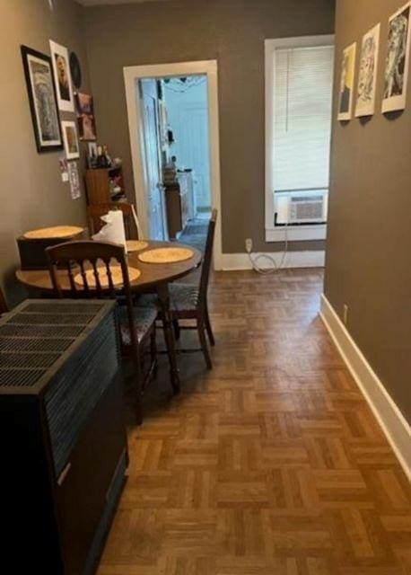 217 Spring St, Mankato, MN 56001 - dining area featuring baseboards and cooling unit
