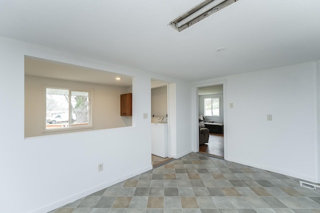 4163 Horseshoe Ct NE, Haverhill Twp, MN 55906 - unfurnished room with washing machine and dryer