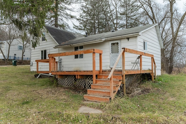4163 Horseshoe Ct NE, Haverhill Twp, MN 55906 - rear view of house featuring a lawn and a wooden deck