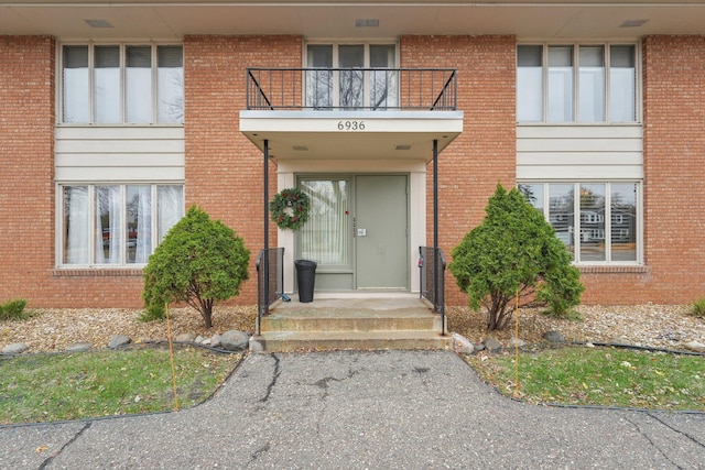 doorway to property with a balcony