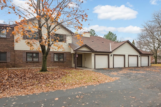 view of front property with a garage