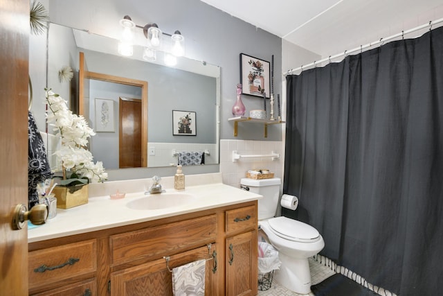 bathroom featuring tile patterned flooring, vanity, tasteful backsplash, and toilet