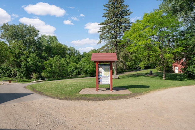 view of jungle gym featuring a lawn