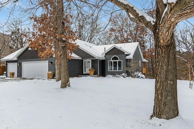 single story home with a garage