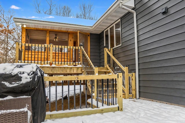 view of snow covered property entrance