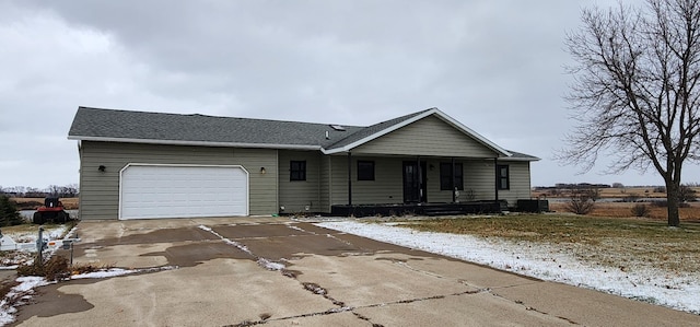 ranch-style home with a garage