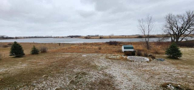 view of yard with a water view