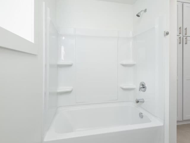 bathroom featuring bathing tub / shower combination