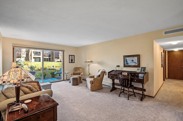 living room with light colored carpet and baseboard heating