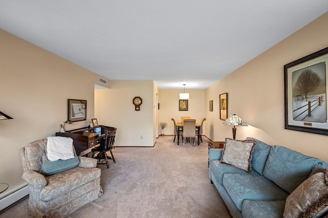 carpeted living room with a baseboard heating unit