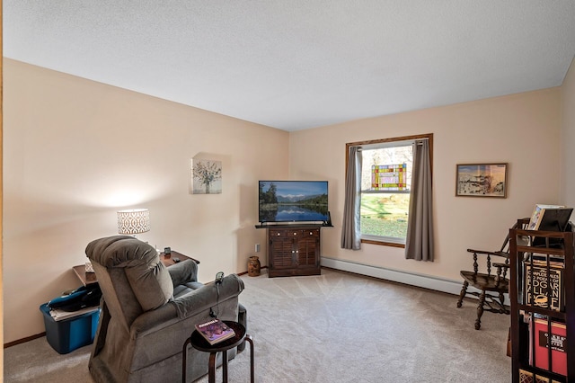 carpeted living room with a textured ceiling and a baseboard heating unit