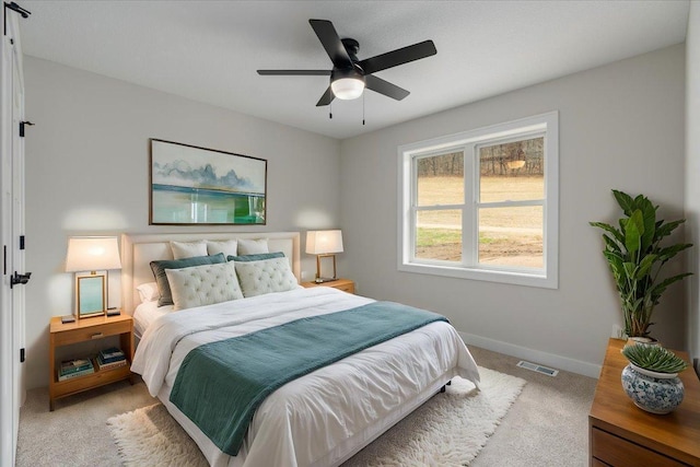 S1546 Shawnee Dr Unit A, Alma, WI 54610 - bedroom featuring light carpet, baseboards, and ceiling fan