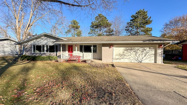 ranch-style house with a front yard and a garage