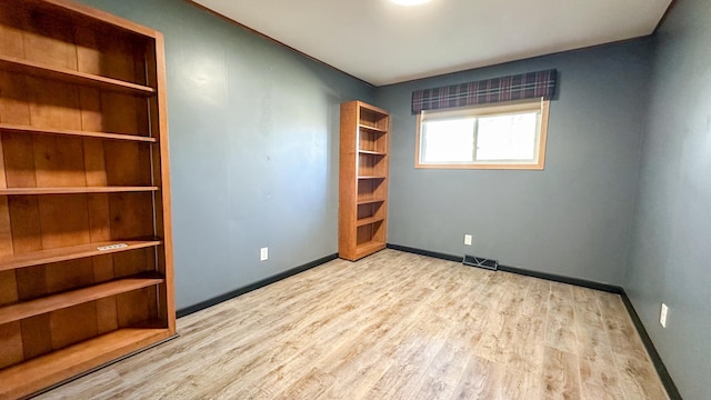 unfurnished bedroom featuring light hardwood / wood-style flooring