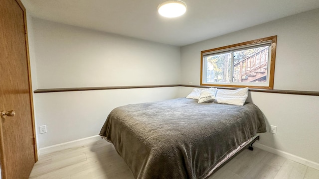 bedroom featuring light hardwood / wood-style flooring