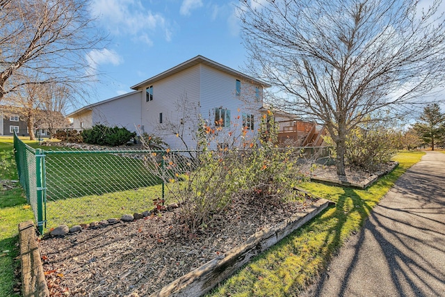 view of home's exterior featuring a yard