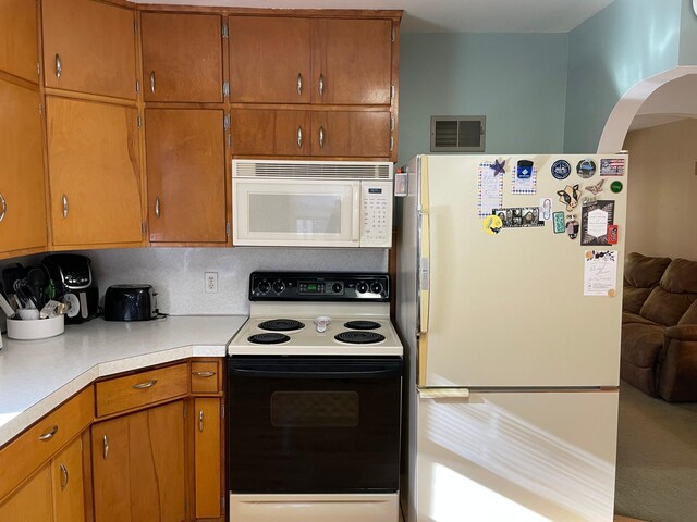 kitchen featuring white appliances