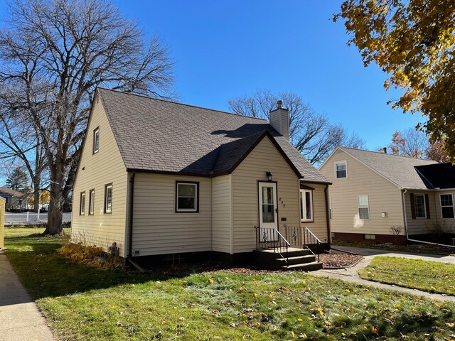 view of front of home with a front yard