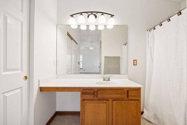 bathroom featuring vanity, tile patterned floors, and ceiling fan