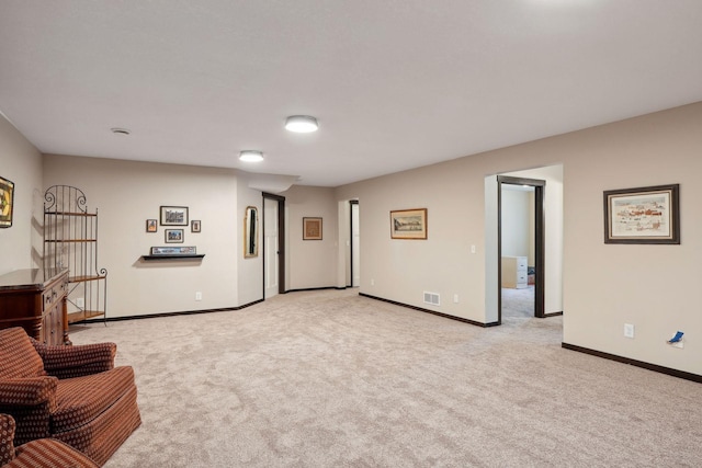 sitting room with light carpet