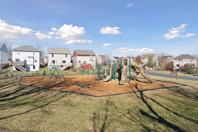 view of playground with a yard