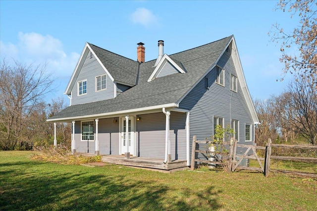 exterior space featuring a yard and a porch