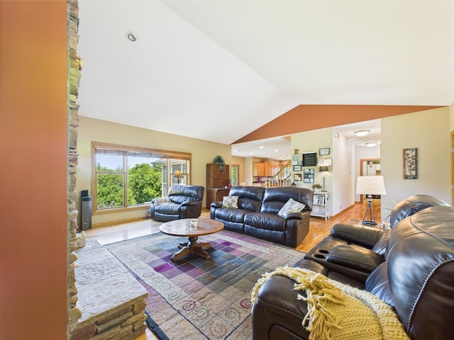 24850 Edenvale Trl, Elko New Market, MN 55020 - living area with vaulted ceiling, wood finished floors, and stairs