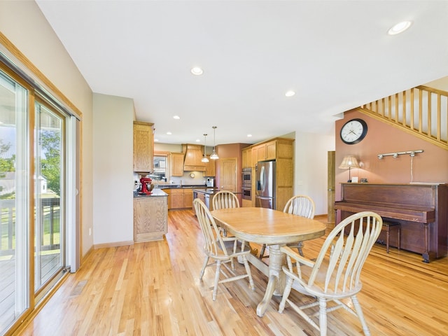 24850 Edenvale Trl, Elko New Market, MN 55020 - dining area with light wood-style flooring and recessed lighting
