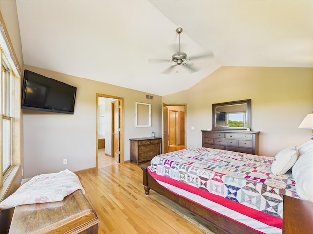 24850 Edenvale Trl, Elko New Market, MN 55020 - bedroom with lofted ceiling, light wood-style flooring, ceiling fan, and connected bathroom