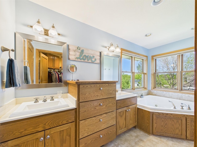 24850 Edenvale Trl, Elko New Market, MN 55020 - bathroom with double vanity, a whirlpool tub, and tile patterned flooring